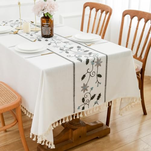 Styled rectangular table with embroidered tassel tablecloth