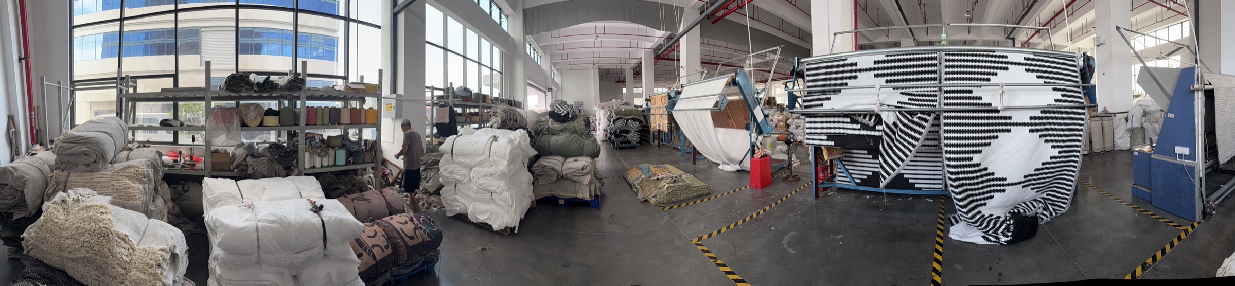 BOYA textile machine and material staging area