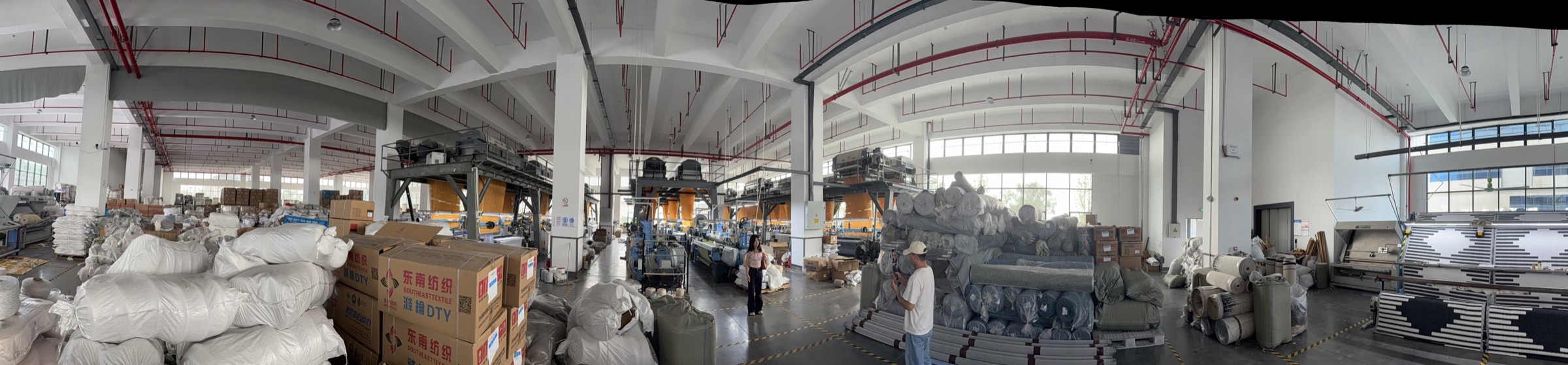 BOYA textile production floor and staged fabric inventory