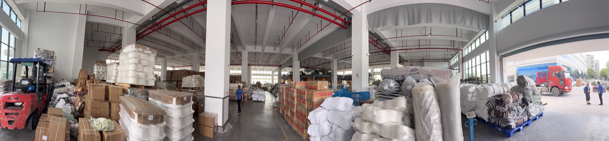 BOYA warehouse loading bay with forklift truck and packed goods
