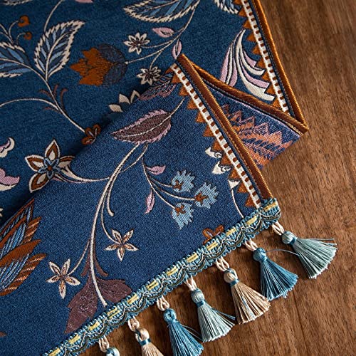 Close-up of floral polyester runner and tassel finish